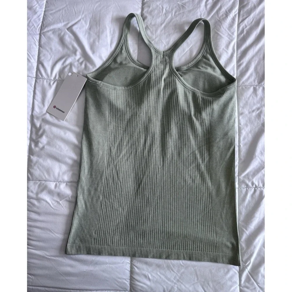 New Lululemon Ebb to Street Tank Top Size 12 W/Bra Hip Length Fog Green NWT